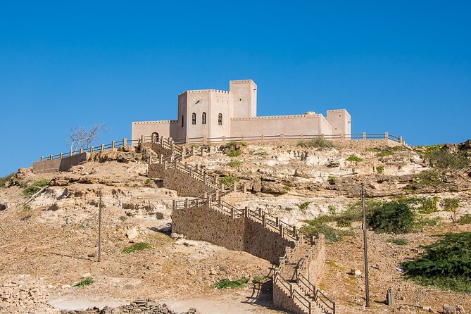 East and West Salalah Combination Private Full-day Tour - Wadi Darbat, camels, water, and seasonal change