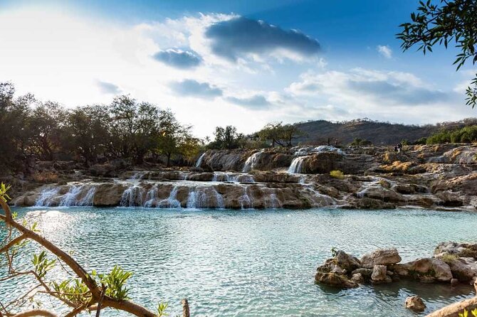 East & West Salalah Combination Tour - Darbat Waterfall, Mughsail - Haffah, coconut palms, and the city drive
