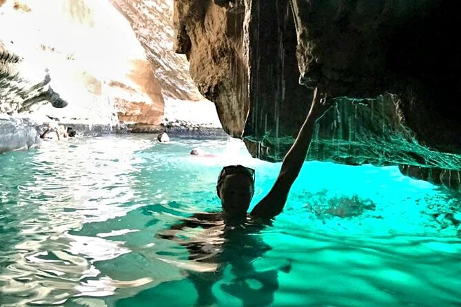 Full Day Group Tour to Wadi Shab Bimmah Sinkhole and Fins Beach - Bimmah Sinkhole: attractive, quick, and easy to overrate
