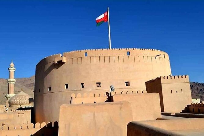 Full-Day Nizwa Fort, Bahla Fort and Jabreen Castle Private Tour - Nizwa Fort and the view from its round tower