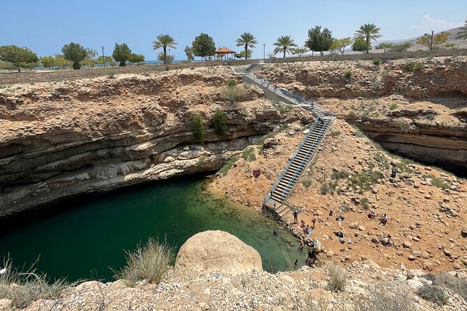 Full Day Private Tour to Wadi Shab and Bimmah Sinkhole - Swimming through the clear pools