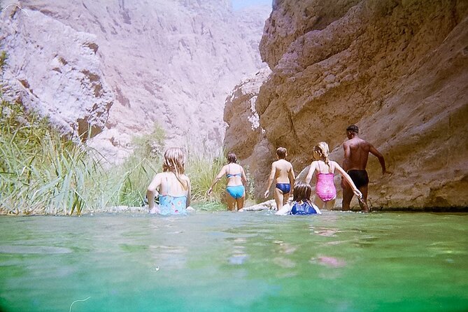Full Day Wadi Shab And Bimah Sinkhole with Pick Up Included - Fins Beach and the coastal road
