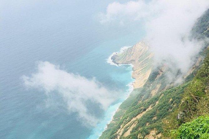 Full day west tour of Salalah - Al-Fezayeh Beach: silver sand and open sea