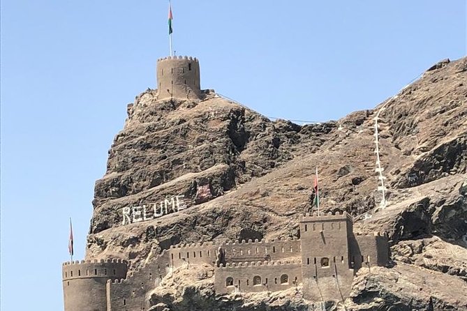 Historical Muscat Sunset Tour - Al Alam Palace from offshore