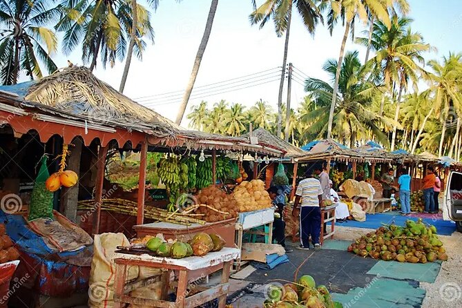 Historical Salalah City Tour - A coconut drink among Salalah’s fruit stalls