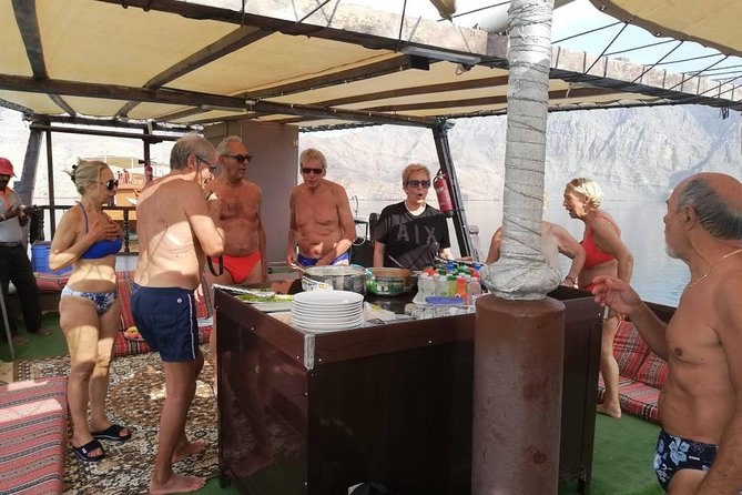 Khasab Dhow Cruise Full day, Buffet Lunch on Board, swimming - Two stops for swimming and snorkeling