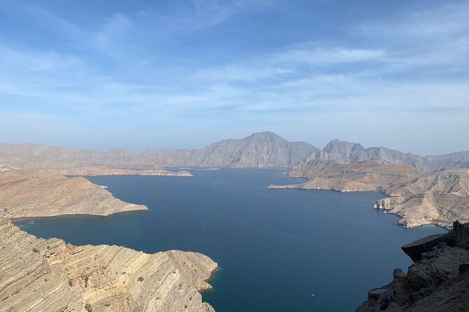 Khasab Dhow Cruise To Musandam Fjords With Lunch Onboard - Dolphin watching near the dhow