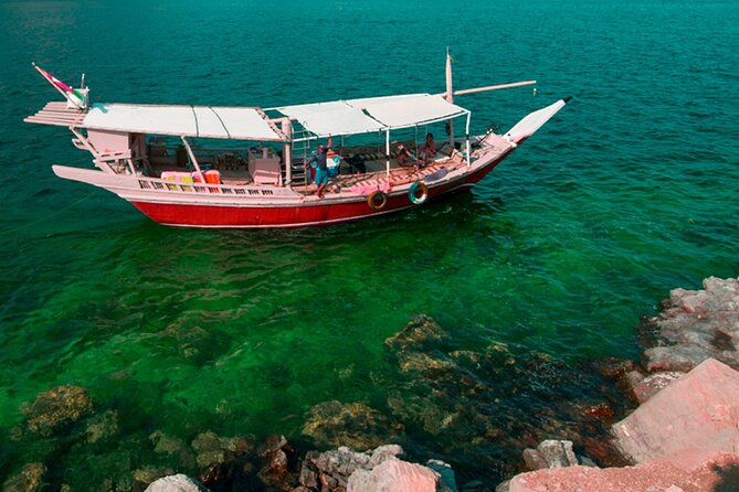Khasab Full Day Dhow Cruise With Enjoying Snorkeling, Lunch & Dolphin Watching - Snorkeling, swimming, and dolphin watching