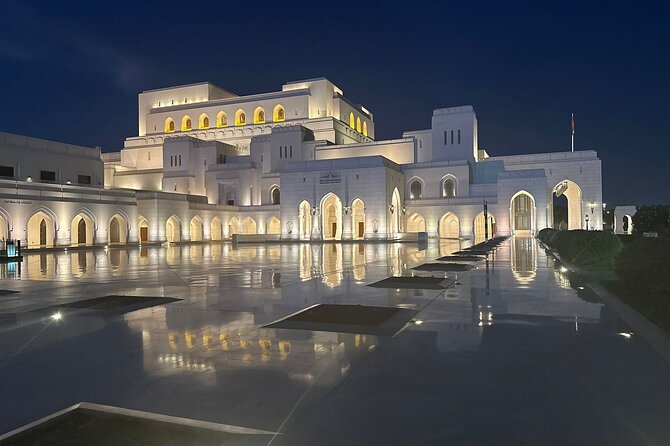 Muscat Private Evening City Tour with pickup from Hotels and Port - Sultan Qaboos Grand Mosque: a brief illuminated stop