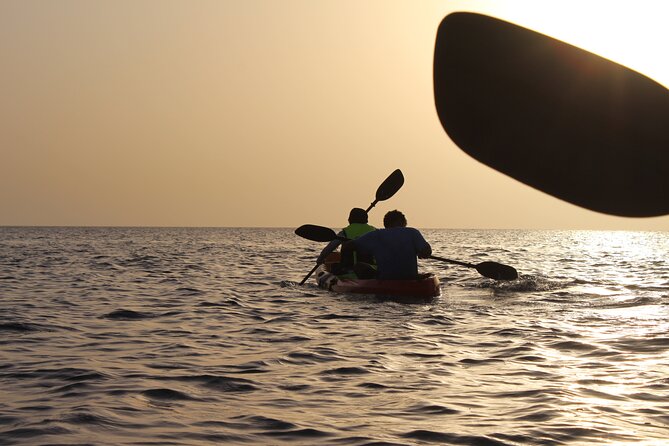 Muscat Sunset Kayak - Paddling along Muscat’s shore