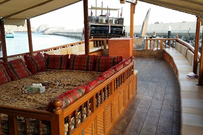 Omani Traditional Dhow Cruise: Sunset and Muscat Coastal View - A look toward Al Alam Palace