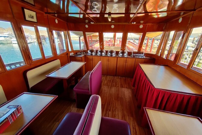 Omani Traditional Dhow Cruise: Sunset and Muscat Coastal View - The sunset pause and the dhow’s change of mood