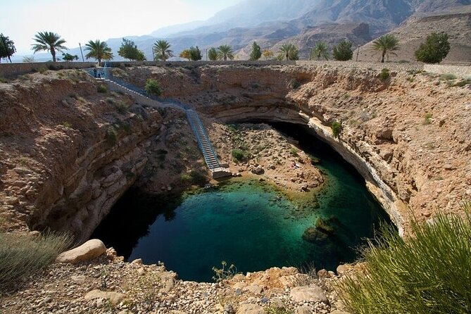 Private Full- Day Wadi Shab-Bimmah Sinkhole-Fins Beach Tour - Fins Beach adds a quiet coastal finish