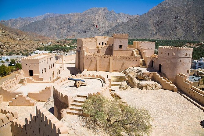 The North & Nakhl Half Day Tour from Muscat - Exploring Nakhl Fort above the village