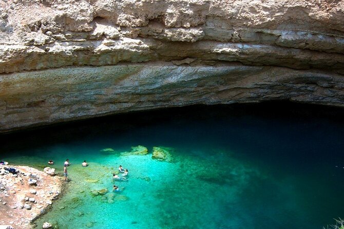 Wadi Shab and Bimmah Sinkhole 4X4 (Private Tour ) - Fins Beach and the coast toward Wadi Shab