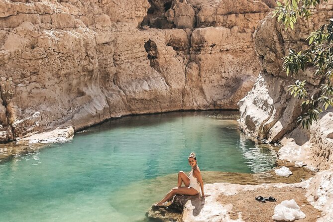 Wadi Shab Coastal Trekking - Swimming through the cave to the waterfall